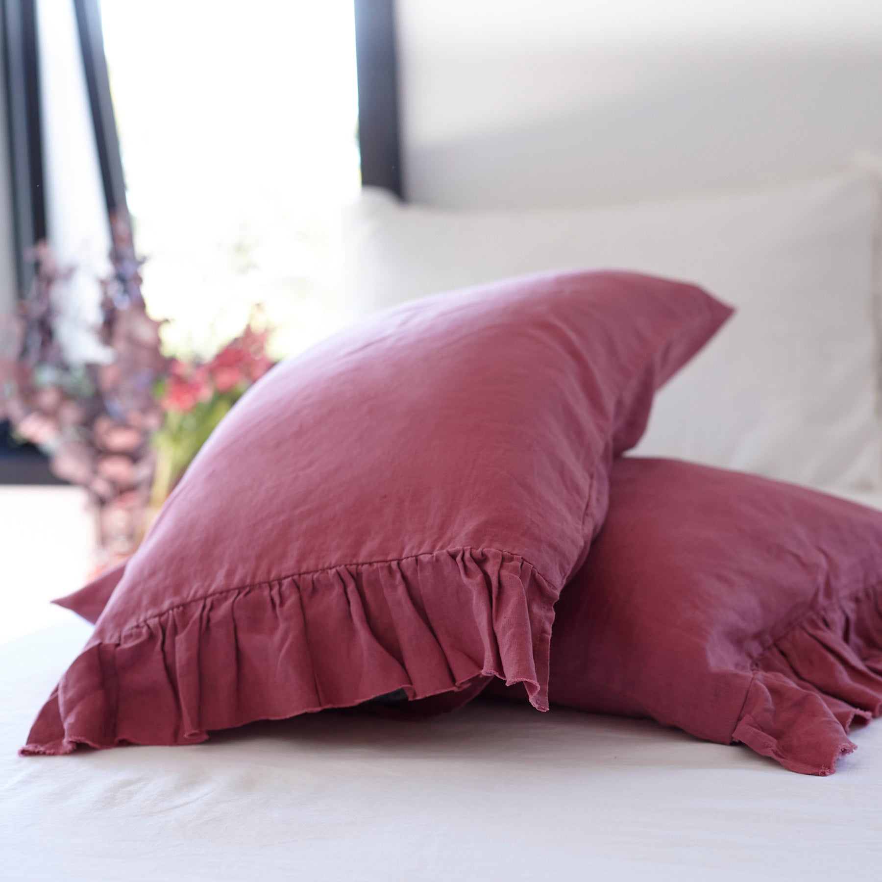 Pair of Ruffled Linen Pillowcases in Raspberry