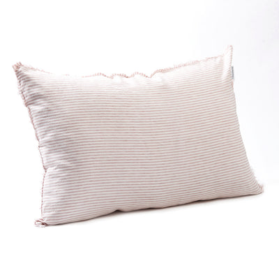 Subtle rosewater striped bedhead cushion in stonewashed French flax linen, with hand-tufted edges, bringing a soft, elegant pattern and a relaxed, feminine touch.