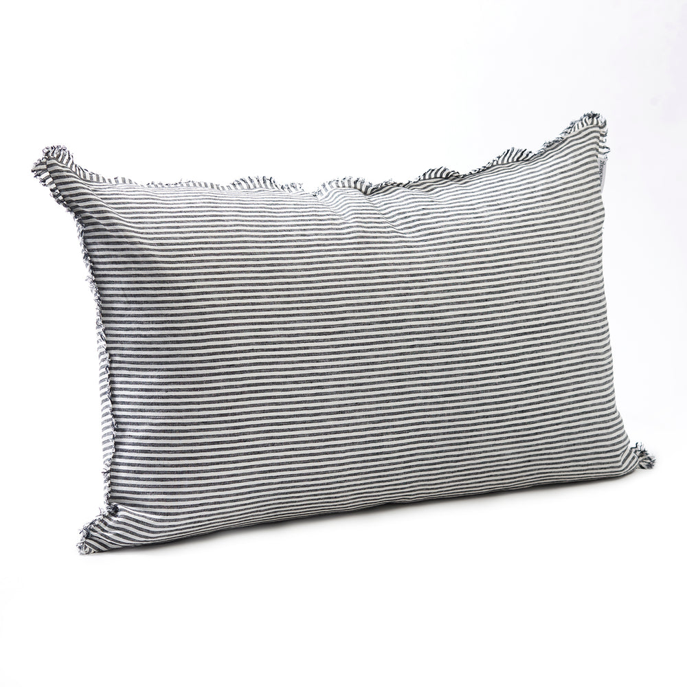 Bold dark charcoal striped bedhead cushion in stonewashed French flax linen, with hand-tufted edges, offering a sophisticated, contemporary pattern and a refined, modern touch.