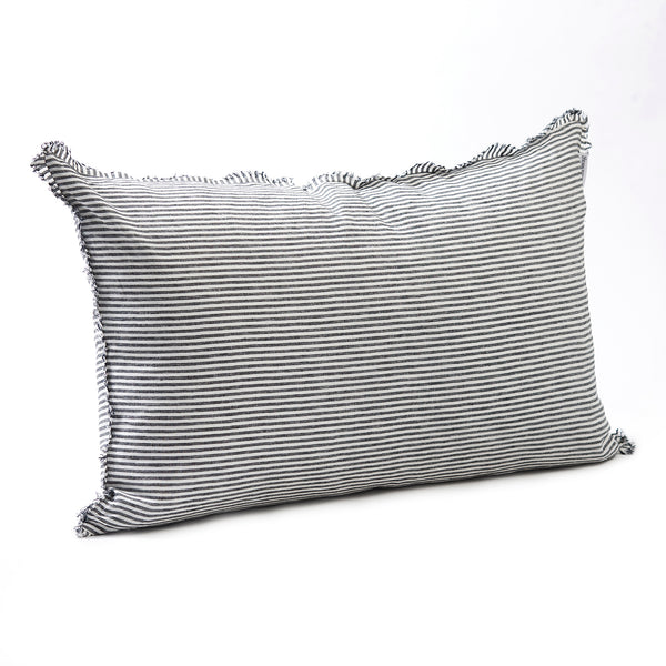 Bold dark charcoal striped bedhead cushion in stonewashed French flax linen, with hand-tufted edges, offering a sophisticated, contemporary pattern and a refined, modern touch.