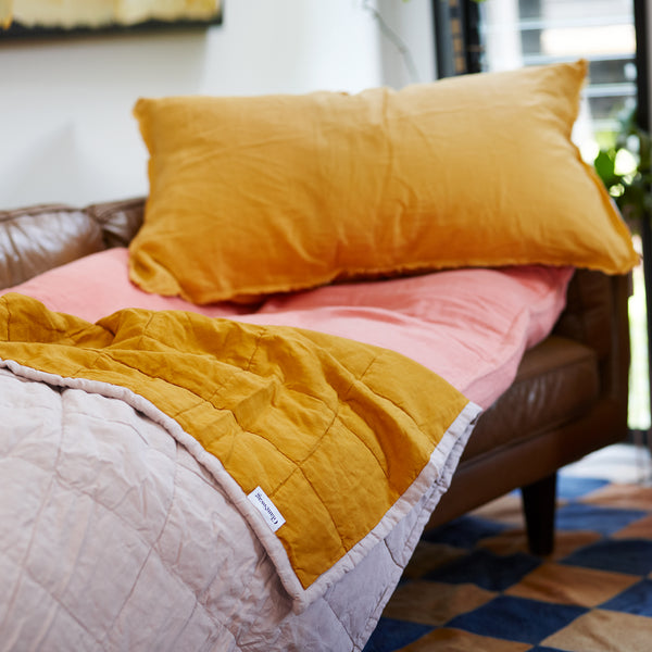 Quilted Throw in Rosewater and Mustard