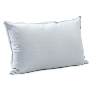 Soft mist bedhead cushion in stonewashed French flax linen, with hand-tufted edges, offering a light, airy hue that adds a serene and tranquil vibe to any space.