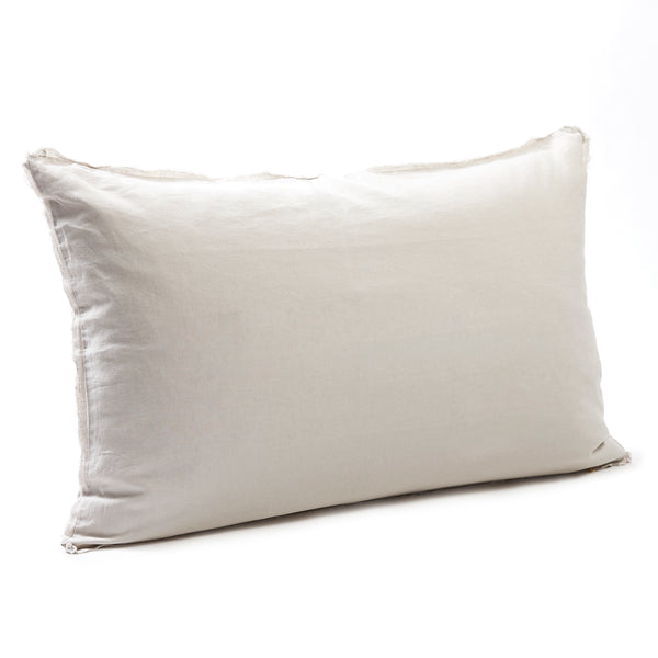 Classic natural bedhead cushion in stonewashed French flax linen, with hand-tufted edges, providing a neutral, understated look with a relaxed, organic charm.