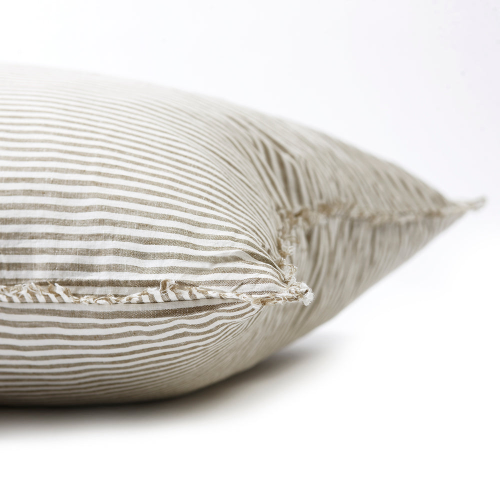 Earthy olive striped bedhead cushion in stonewashed French flax linen, with hand-tufted edges, offering a sophisticated, natural pattern and a relaxed, organic touch.