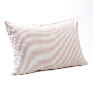 Subtle rosewater striped bedhead cushion in stonewashed French flax linen, with hand-tufted edges, bringing a soft, elegant pattern and a relaxed, feminine touch.